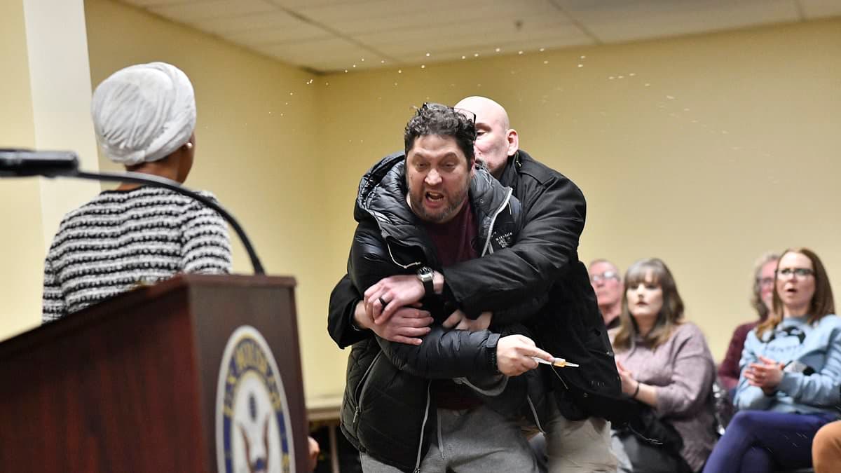 Man armed with a syringe attacks Minnesota Democrat Ilhan Omar as bitter fallout from 'execution' of nurse by ICE rocks America