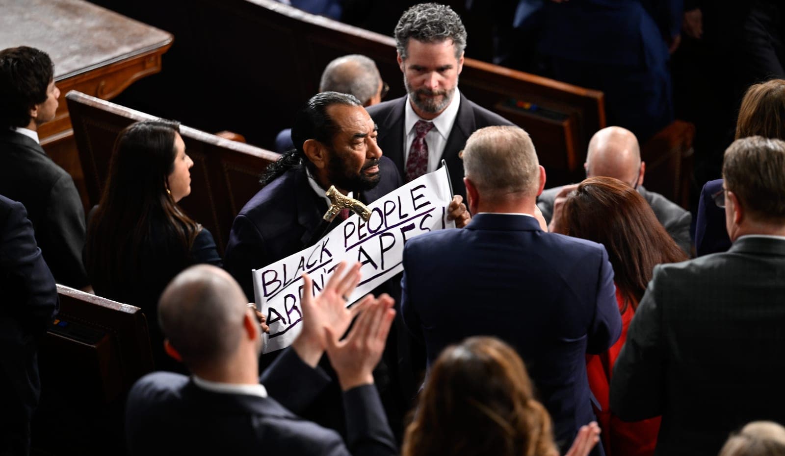 Al Green waves 'Black people aren't apes' sign at State of the Union