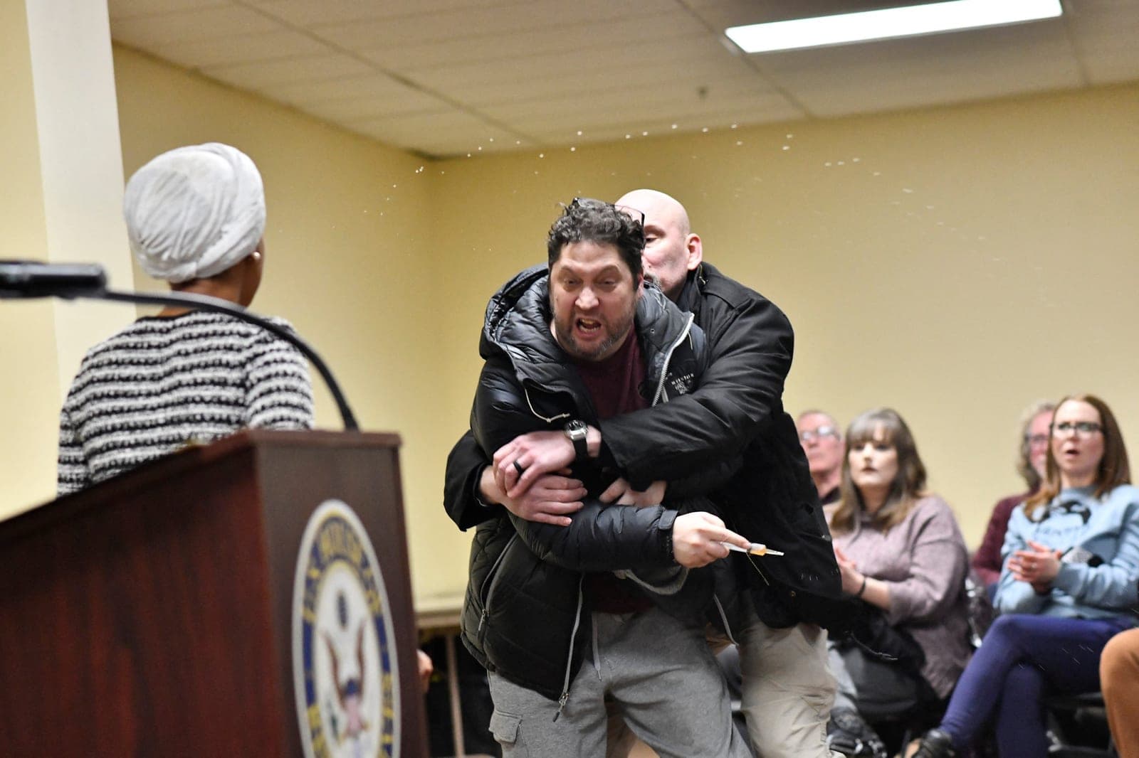 Trump accuses Ilhan Omar of 'having herself sprayed' after congresswoman attacked with unknown substance
