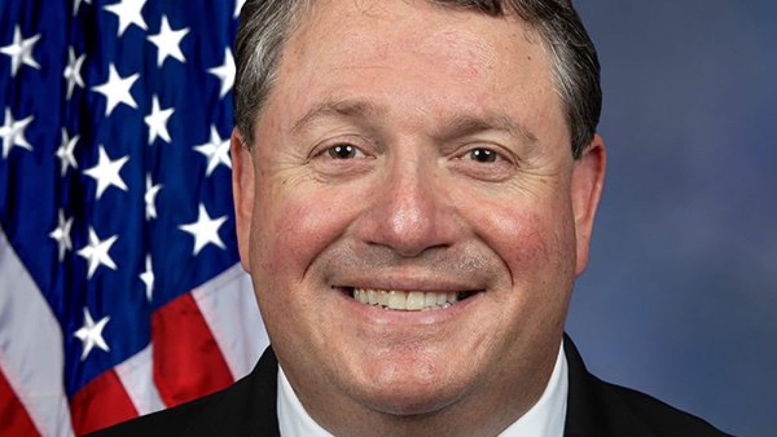 U.S. Congressman Randy Fine peeks inside mailbox