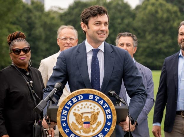 CNN WIRE - Ossoff calls Trump a 'draft-dodging, crook president'