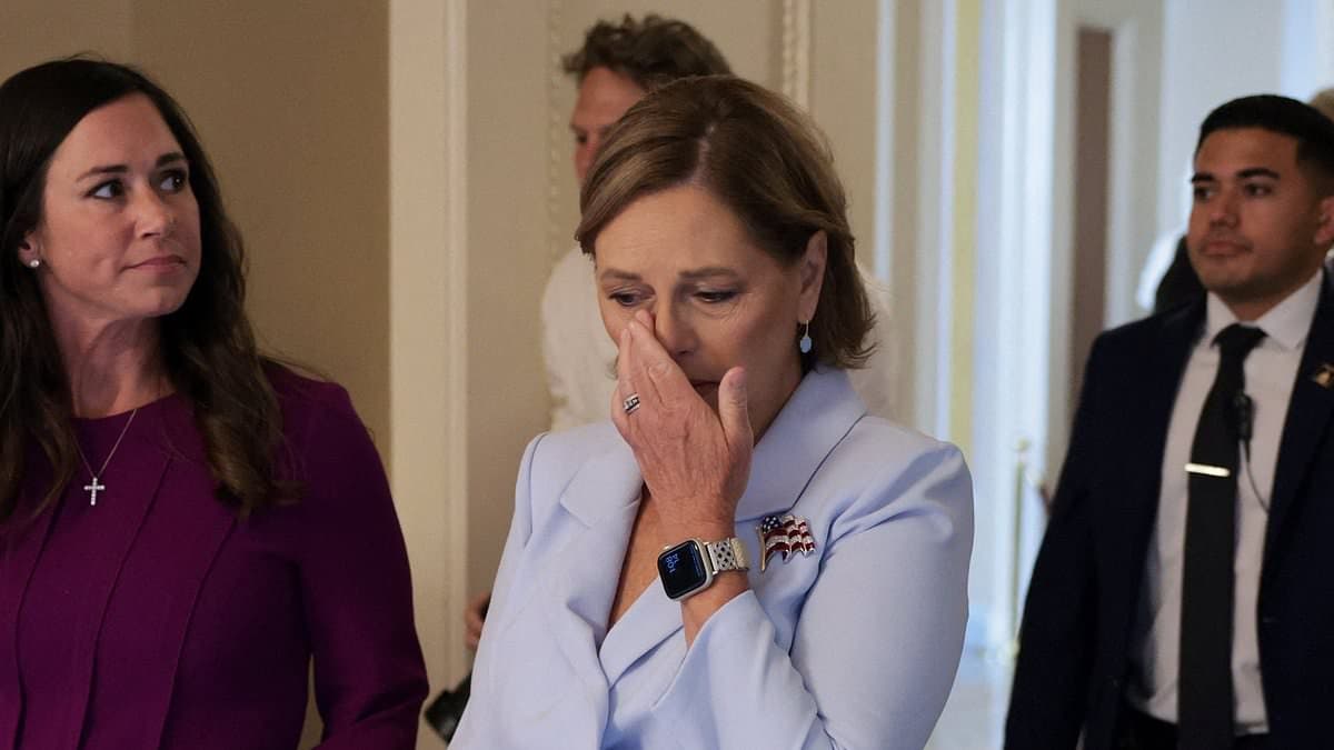 Lindsey Graham's teary-eyed sister is sworn in to fill her beloved brother's Senate seat