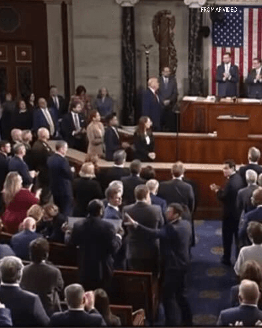 Sen. Markwayne Mullin attempts to grab sign from Rep. Al Green