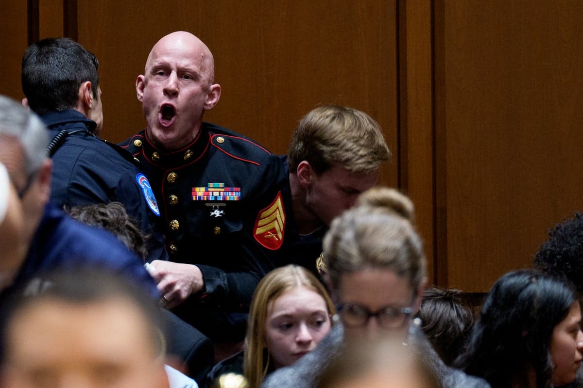 Marine vet whose arm was broken when senator tossed him from Iran war briefing 'got in a little too deep,' says mom