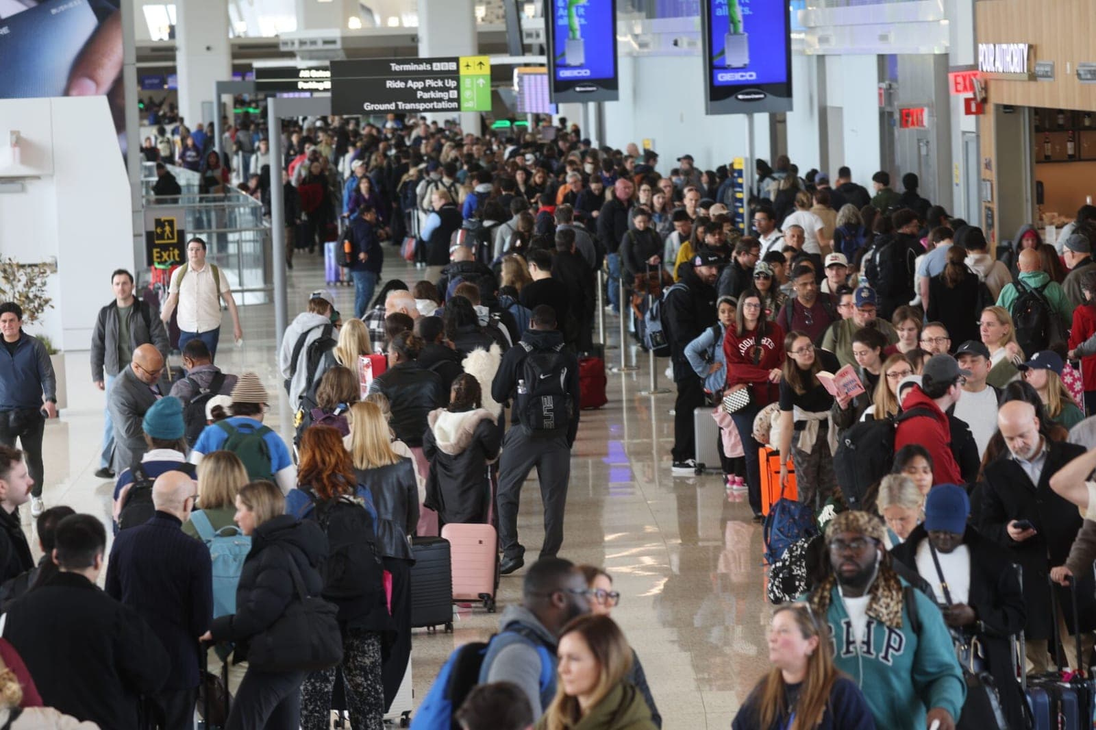 Passengers pack airport security lines as US Senate remains snarled over DHS shutdown