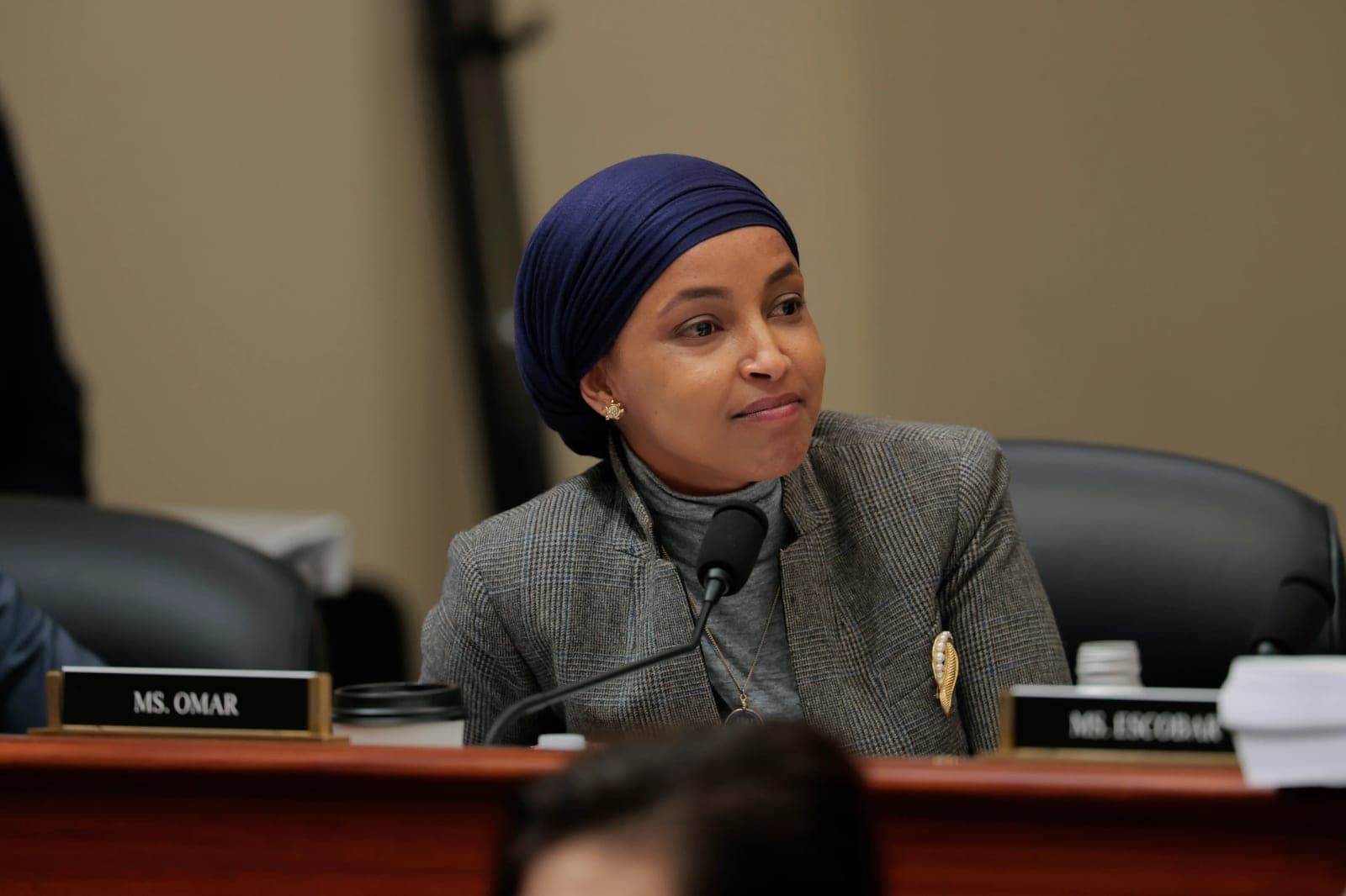 Ilhan Omar says she will "be here probably longer than Trump" when Laura Loomer's reporter asks her if she has "begun packing" her bags for Somalia