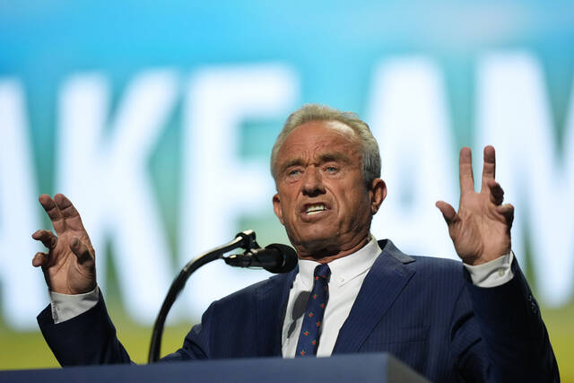 Democrats press RFK Jr. on an ethics agreement change involving law firm fees