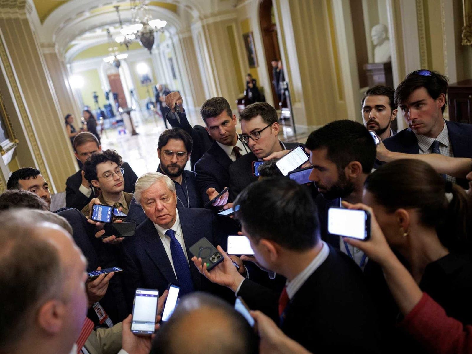 Onlookers befuddled by Lindsey Graham's head-spinning praise of Trump's Iran deal
