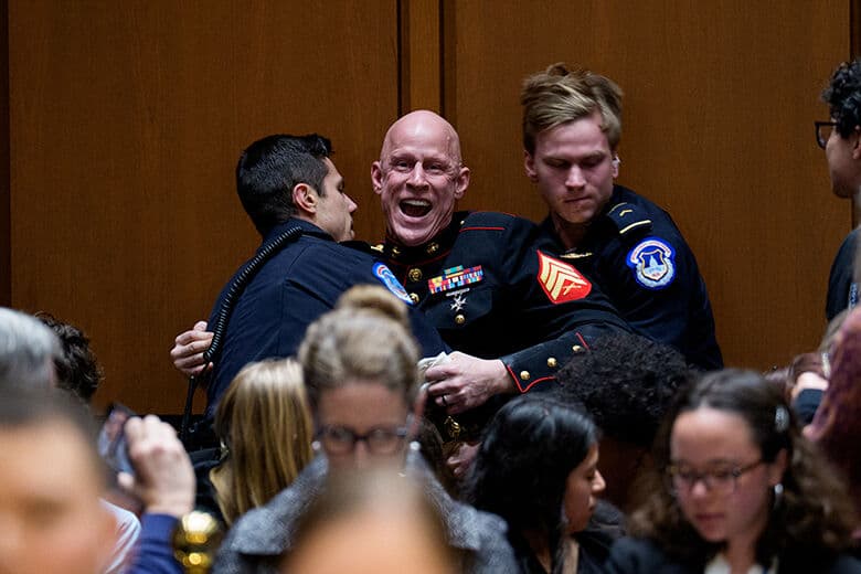 Protester, three Capitol Police officers treated for injuries after scuffle in Senate hearing room